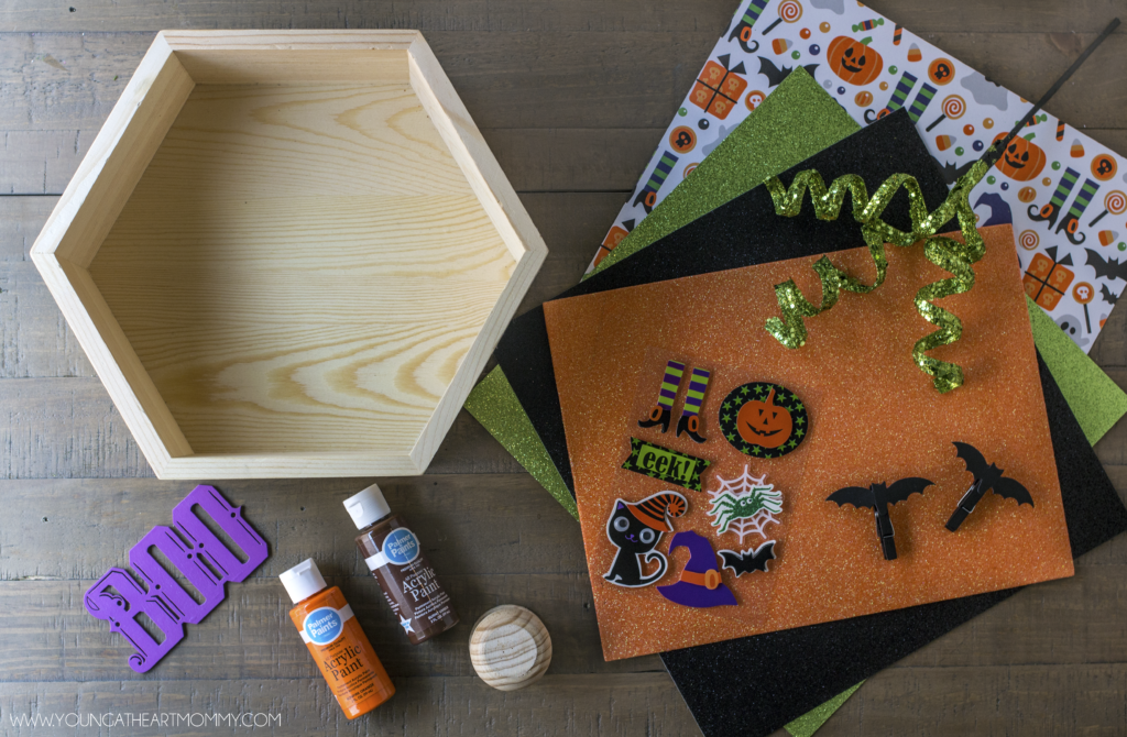 How to turn a wooden shadowbox into a pumpkin Halloween frame.